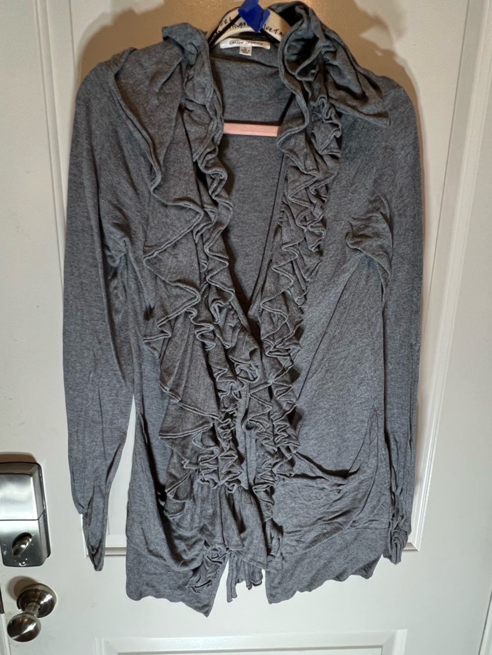 Blue Tassel Ruffled Cardigan. New. Size: L.  Retail: $198.  Ask: $89.